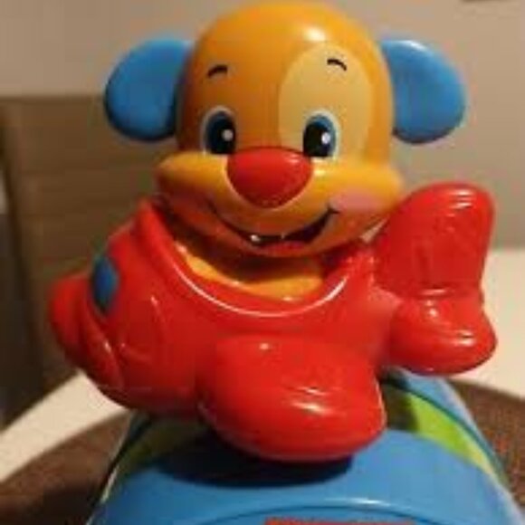 Fisherprice Abc's 123 Laugh & Learn Puppy Aeroplane Weighted Roll Mirror Toy - Picture 3 of 3